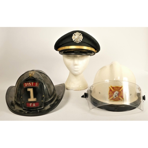 109 - A collection of three American fire department headwear, including a Prudhoe Bay, Alaska fire depart... 