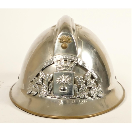 113 - A French fire helmet, chromed brass with Sapeurs Pompiers De L'essonne crest, fitted leather cap wit... 