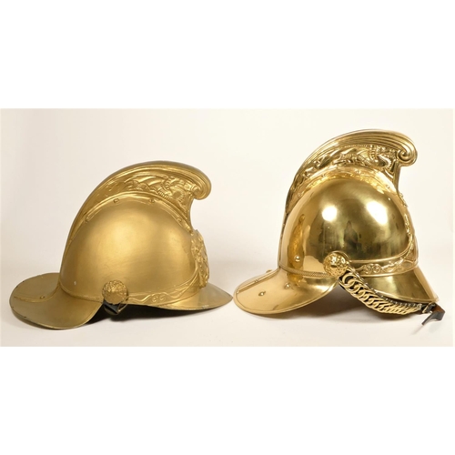 114 - A Merryweather Fire Helmet, brass with decorated high comb, LCC LFB crest to front complete with lin... 