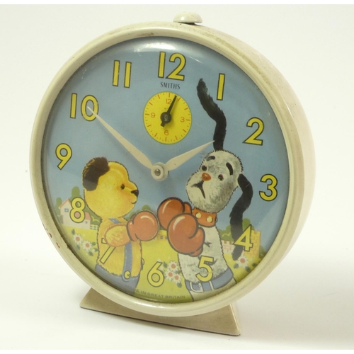 120 - Four Smith's character wind alarm clocks, including two depicted Noddy being woken with automated no... 