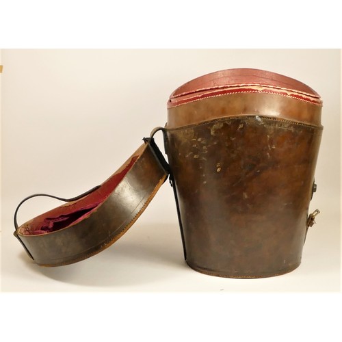 155 - A double silk lined leather top hat box, with leather strap hinged lid, together with a hunting jack... 