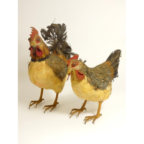 165 - Three models in the form of a Cockerel, Chicken and Pilot, cockerel and chicken feathers attached to... 