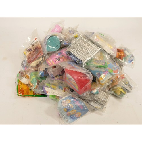 173 - A collection of 200 McDonalds Happy Meal toy sets, bagged, 1980 through 1990, to include franchises ... 