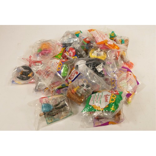 174 - A collection of 60 McDonalds USA Happy Meal toys, complete sets, original packaging, to include fran... 