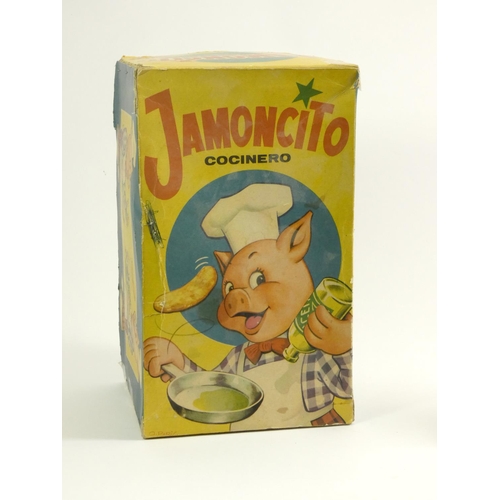 183 - A Jamoncito cocinero cooking chef automaton, in the form of pig, plastic with fabric clothing, wind ... 