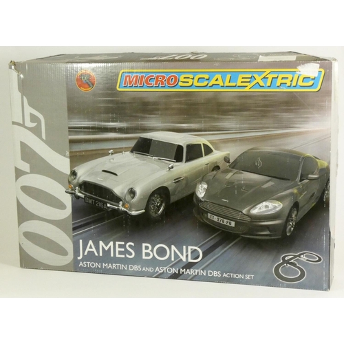 205 - A Scalextric 1:64 scale micro James Bond, Aston martin BD5 and Aston Martin DBS action set, boxed wi... 