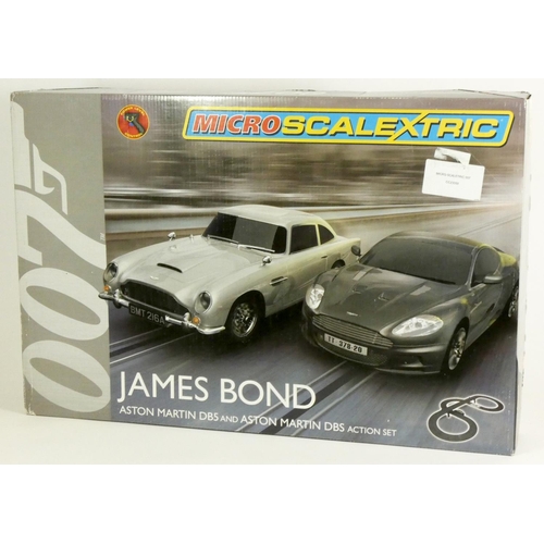 206 - A Scalextric 1:64 scale micro James Bond, Aston Martin BD5 and Aston Martin DBS action set, boxed wi... 