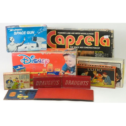 207 - A collection of eleven play sets, including a Disney trainset, Capsela construction kit and others