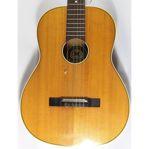 213 - A Musima acoustic guitar, in soft carry case