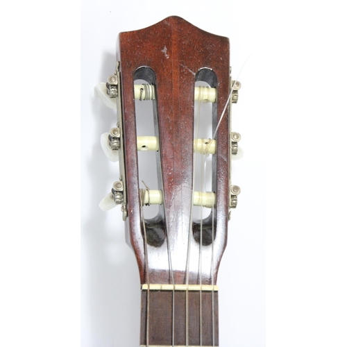 213 - A Musima acoustic guitar, in soft carry case