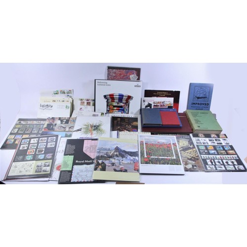 235 - A large collection of stamps to include year packs from 1984 - 2011, several school boy albums, over... 