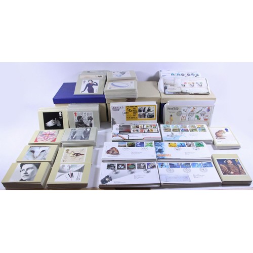 235 - A large collection of stamps to include year packs from 1984 - 2011, several school boy albums, over... 