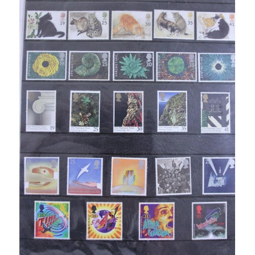 235 - A large collection of stamps to include year packs from 1984 - 2011, several school boy albums, over... 