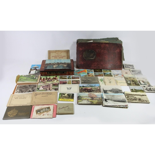 236 - An album of early 20th century and later postcards, mainly by Bamforth, WWI era, approximately 350, ... 