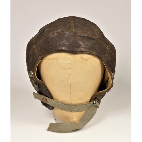 244 - A WWII era leather flying helmet, lacking ear covers