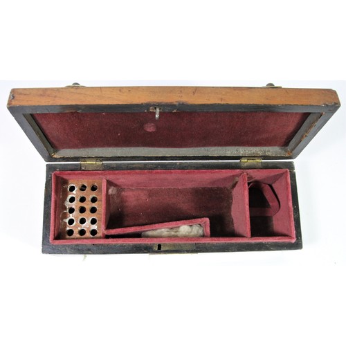 239 - A mahogany and ivorine mounted domed pistol box, opening to reveal a fitted interior, 26 x 9 x 7cm