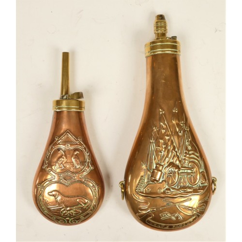 248 - A reproduction Colt's Patent embossed copper powder flask, decorated with cannons and flags and stam... 