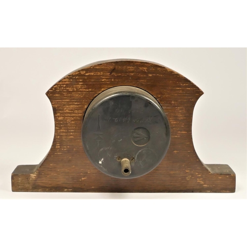 253 - A 35,000 feet altimeter mounted in an oak frame, broad arrow mark to reverse and a Military marching... 