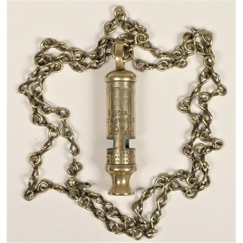 255 - A WWI Special Constable The Metropolitan Whistle, dated 1914, patent number 5727.08, chain