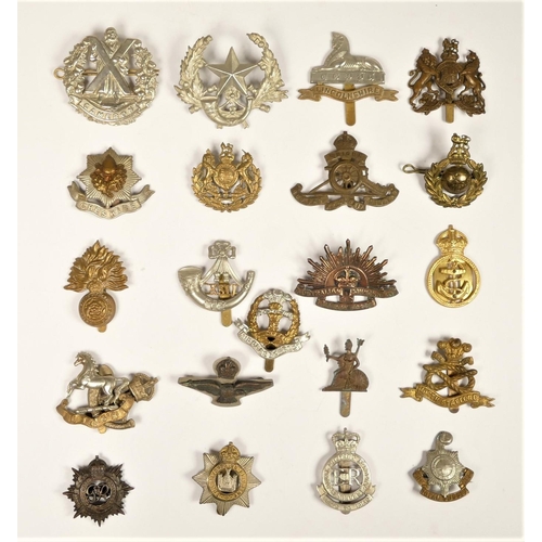 257 - A collection of 22 military cap badges, to include Australian and North Staffs