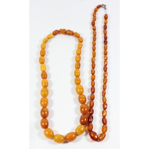 A honey coloured graduated amber bead necklace, untested, 15 - 10mm ...