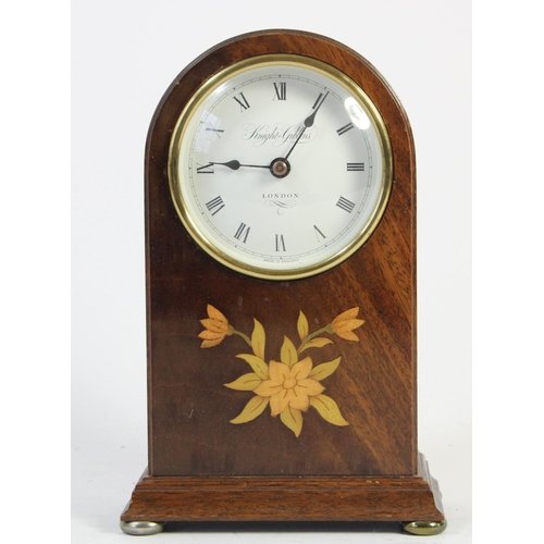 A Knights & Gibbins, London, a mahogany mantle clock, the white