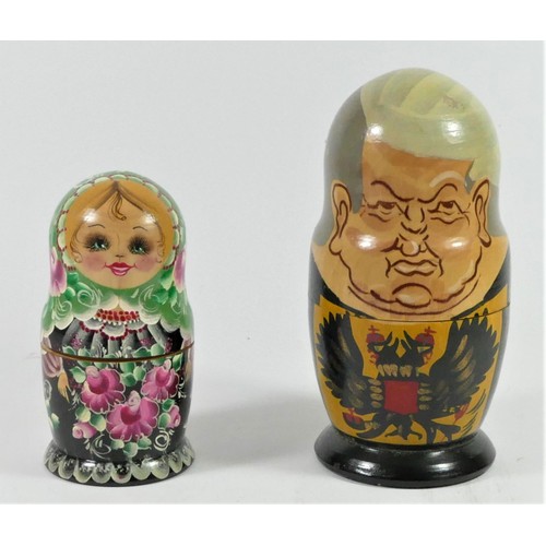 A set of seven Russian President nesting dolls made by Matryoshka together with a set of five nest