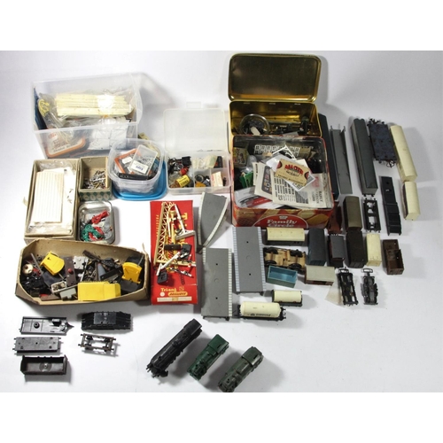 1 - A collection of model railway parts to include, cables, movements, switches, tender and others.