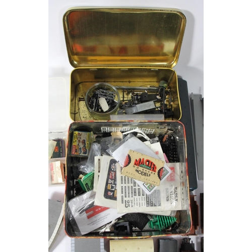 1 - A collection of model railway parts to include, cables, movements, switches, tender and others.