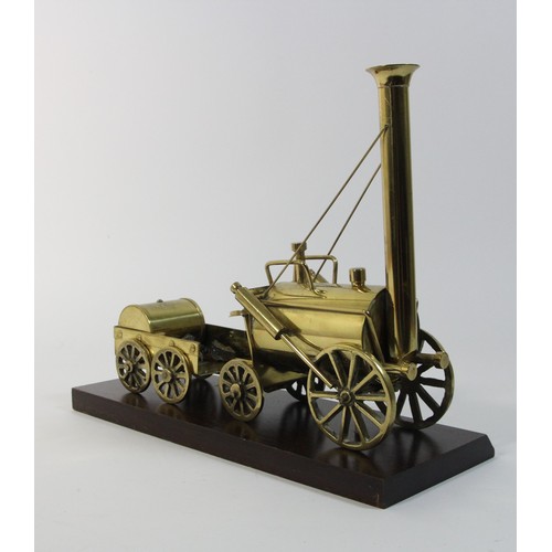 7 - A brass Stephenson's Rocket model on wooden base, 24 x 28 cm (24 x 33 cm on base)

Stephenson's Rock... 