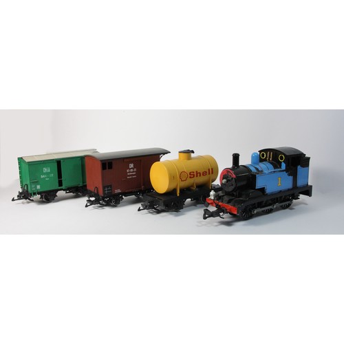 9 - A Bachmann G-Scale 'Thomas' locomotive together with 3 Lehmann goods wagons to include Shell tanker