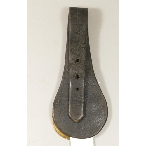 66 - An N.E.R horsebrass attached to leather strap, stamped N.E.R together with, an N.E.R horsebrass (wit... 