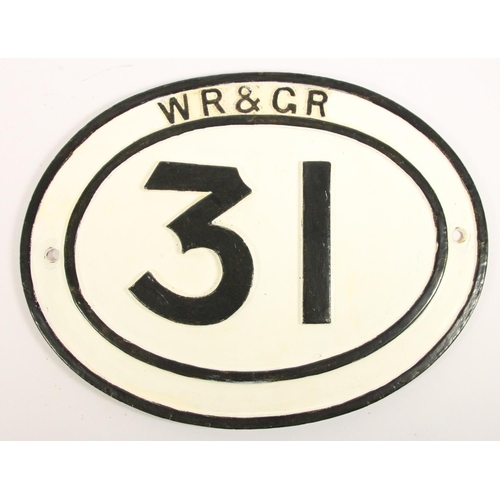 100 - A cast iron oval bridge plate, WR & GR 31