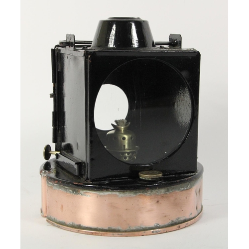 157 - A signal lamp with round copper base, case stamped G.W.R Reading, complete with burner marked BR/WR