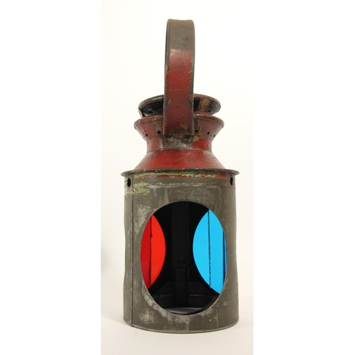 159 - An L.M.S. red 3 aspect handlamp, war version with slatted glass aspects, case stamped L.M.S complete... 