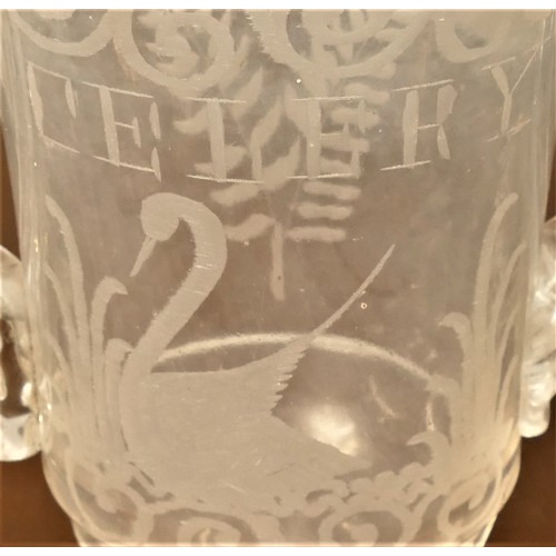 85 - A Victorian press moulded glass two handled vase, wheel engraved CELERY over a swan, 27cm together w... 