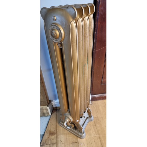 82 - An Edwardian cast iron gas fired St. Andrew radiator, by J.Wright & Co., Birmingham, 105 x 26 x 21cm... 