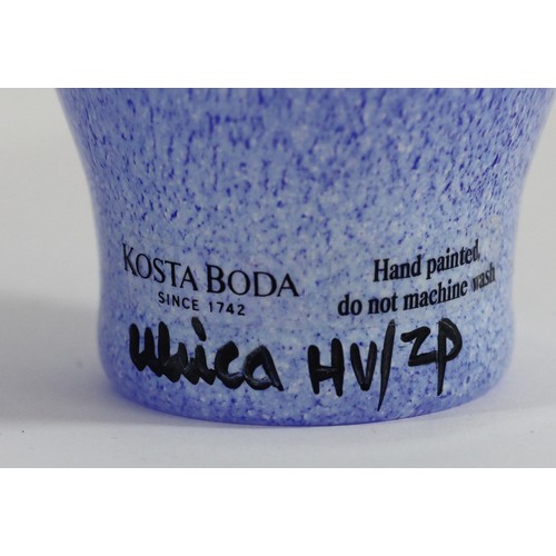 87 - A Kosta Boda Open Minds vase, designed by Ulrika Hydman-Vallien, on a mottled white and blue ground,... 