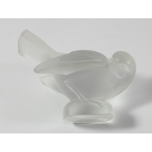 89 - A Lalique frosted glass bird, etched in script 