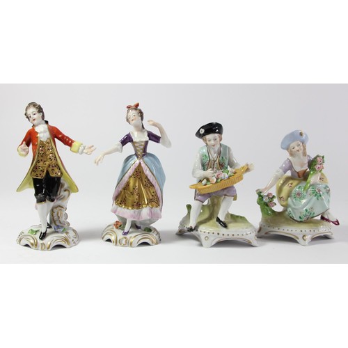 95 - Four 19th century continental porcelain figurines to include, two Sitzendorf figures depicting a mal... 