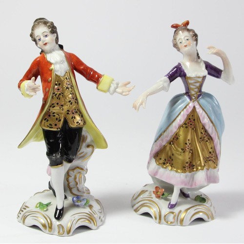 95 - Four 19th century continental porcelain figurines to include, two Sitzendorf figures depicting a mal... 