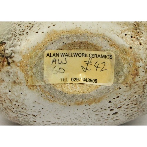 98 - Alan Wallwork (1931- 2019); a stoneware split pebble with impressed decoration around the parting, i... 