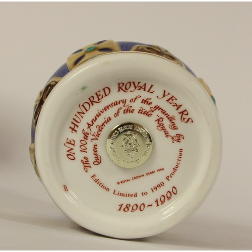 109 - A boxed Royal Crown Derby crown paperweight with silver plug, stamped 'One Hundred Royal Years 1890-... 