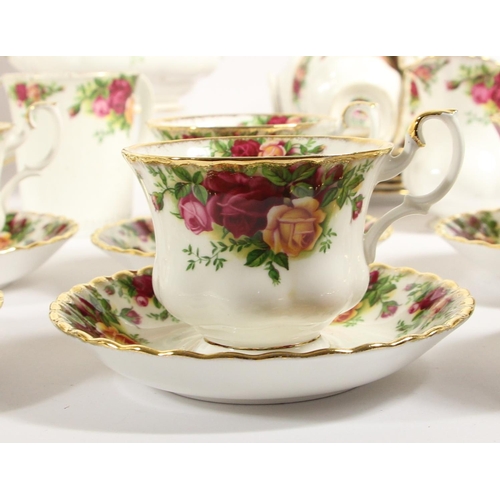 113 - A Royal Albert Country Roses 8 place dinner/tea service to include, teacups (14) 8cm, saucers (14) 1... 