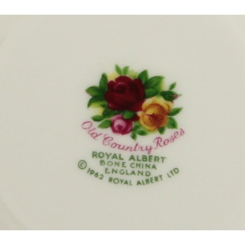 113 - A Royal Albert Country Roses 8 place dinner/tea service to include, teacups (14) 8cm, saucers (14) 1... 