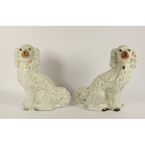 114 - Two 20th century Staffordshire Pottery Spaniels, 31 x 30cm