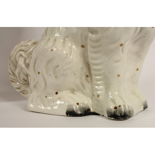 114 - Two 20th century Staffordshire Pottery Spaniels, 31 x 30cm