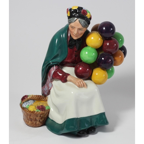 123 - Two Royal Doulton figurines to include, The Master (HN2325) 16cm and The Old Balloon Seller (HN1315)... 