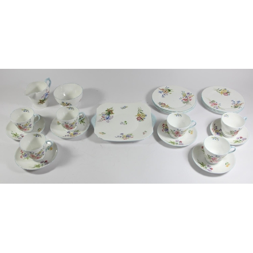 124 - A Shelley, England, Wild Flowers pattern 13668 six piece tea service to include, teacups 7x8cm, sauc... 