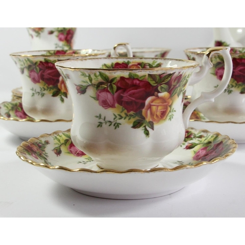 125 - A Royal Albert Country Roses six piece tea service to include, teacups 8cm, saucers 14cm, sandwich p... 